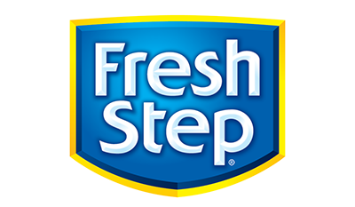 A Fresh Step cat litter advertisement featuring a Pet Supermarket cat peticon next to a cat in a litter box and a bag of Fresh Step cat litter with a cat sitting beside it.